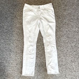 Flattering distressed white jeggings